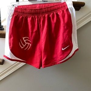 Nike running shorts with volleyball logo
